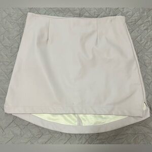 light pink “leather” mini skirt
